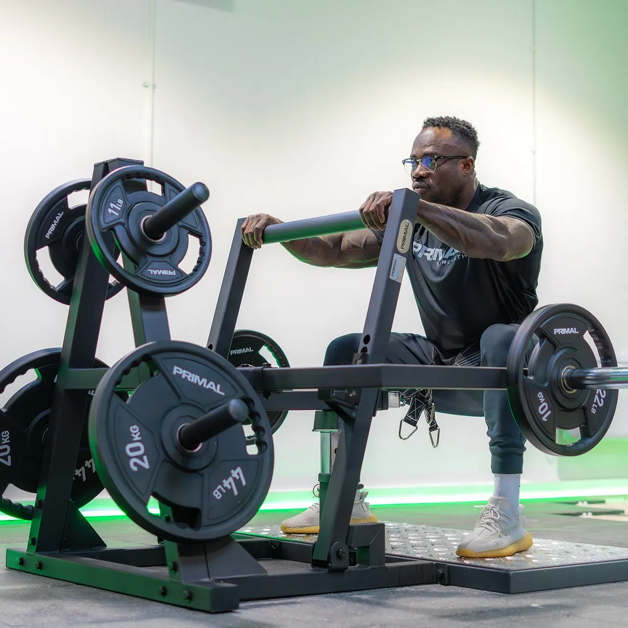 Primal Pro Belt Squat machine ceinture charge olympique